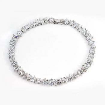 MIXED CUT MOISSANITE TENNIS BRACELET IN SOLID GOLD