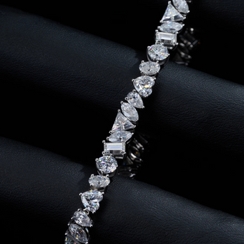 MIXED CUT MOISSANITE TENNIS BRACELET IN SOLID GOLD