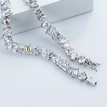 MIXED CUT MOISSANITE TENNIS BRACELET IN SOLID GOLD