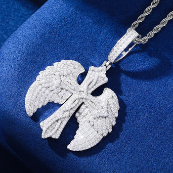 Silver angel wings pendant on a blue background