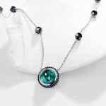 MOISSANITE AQUA ECLIPSE NECKLACE IN SOLID GOLD