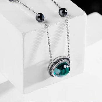 MOISSANITE AQUA ECLIPSE NECKLACE IN SOLID GOLD