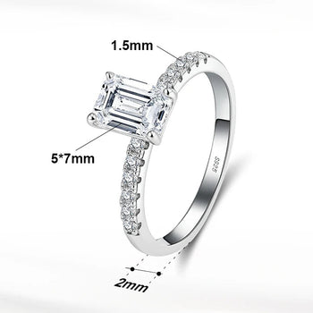 Silver ring with diamond accents and product details on a white background