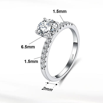 Silver ring with diamond-like stone, measurements, and product details on a white background