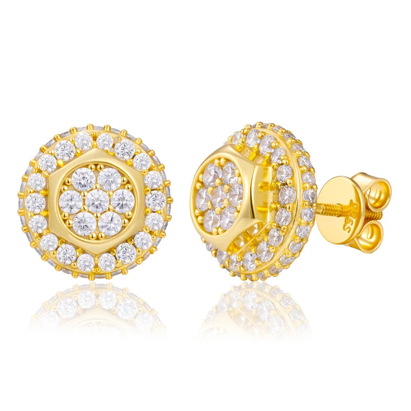 Gold earrings with clear gemstones on a white background
