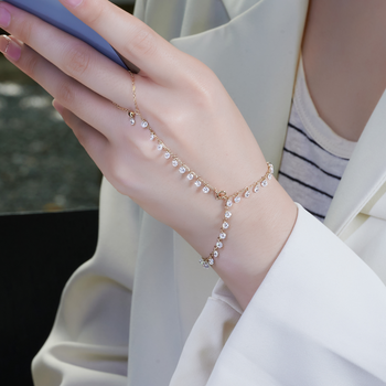 MOISSANITE DANGLE HAND HARNESS BRACELET IN SOLID GOLD