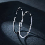 50MM MOISSANITE DAZZLING LARGE HOOP EARRINGS IN STERLING SILVER