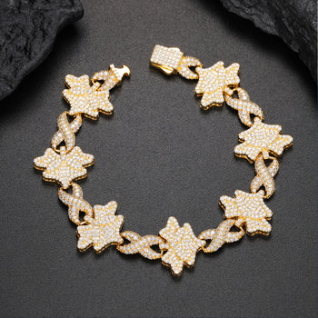 Bracelet en argent sterling orné de diamants et de pierres précieuses en forme d'étoile infinie.