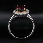 OVAL CUT LAB GROWN RUBY AND MOISSANITE HALO RING IN 9K SOLID GOLD
