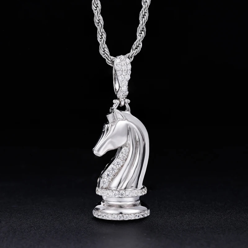Silver necklace with a horse pendant on a black shirt