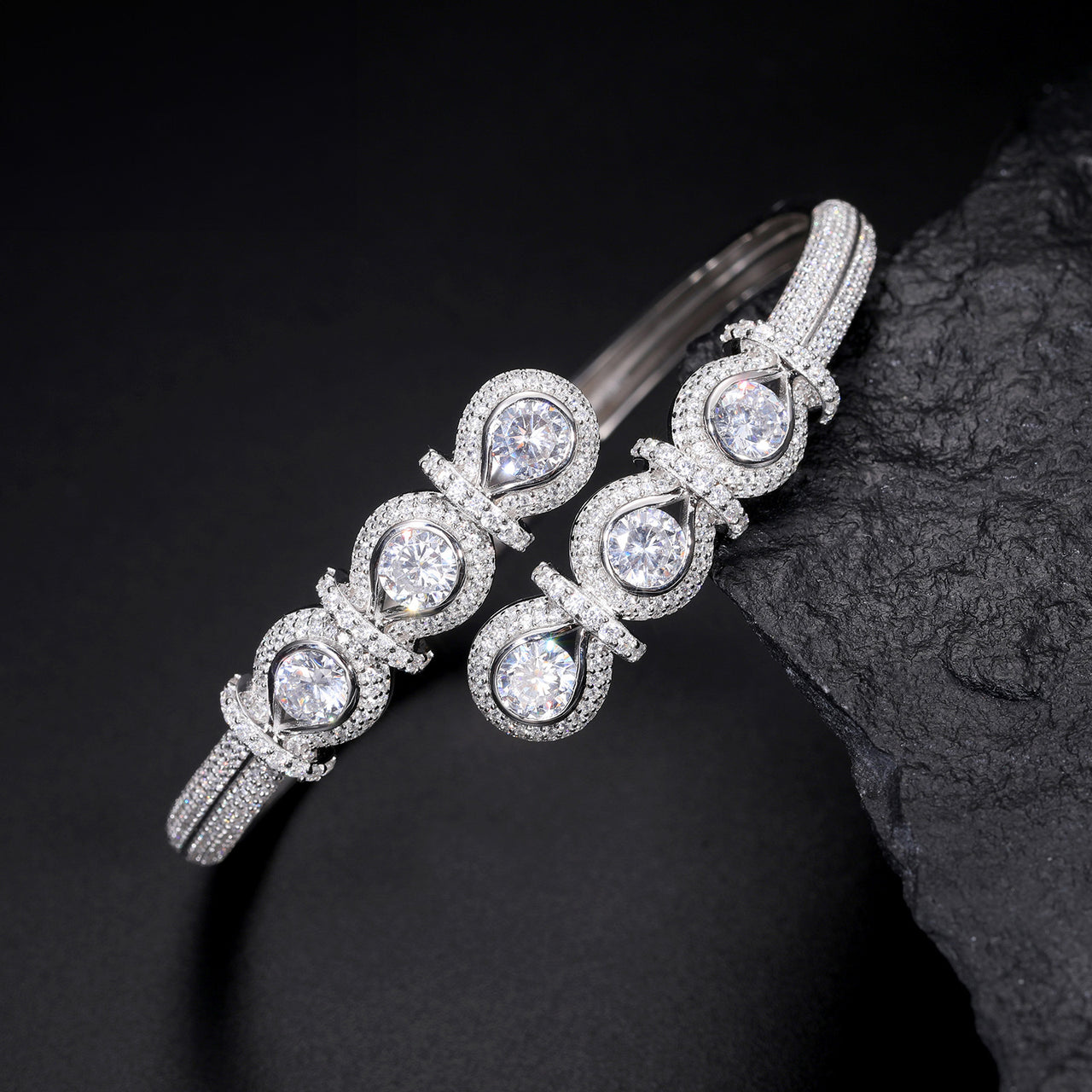 MOISSANITE DIAMOND CLUSTERED STAR RIBBON BANGLE BRACELET IN STERLING SILVER