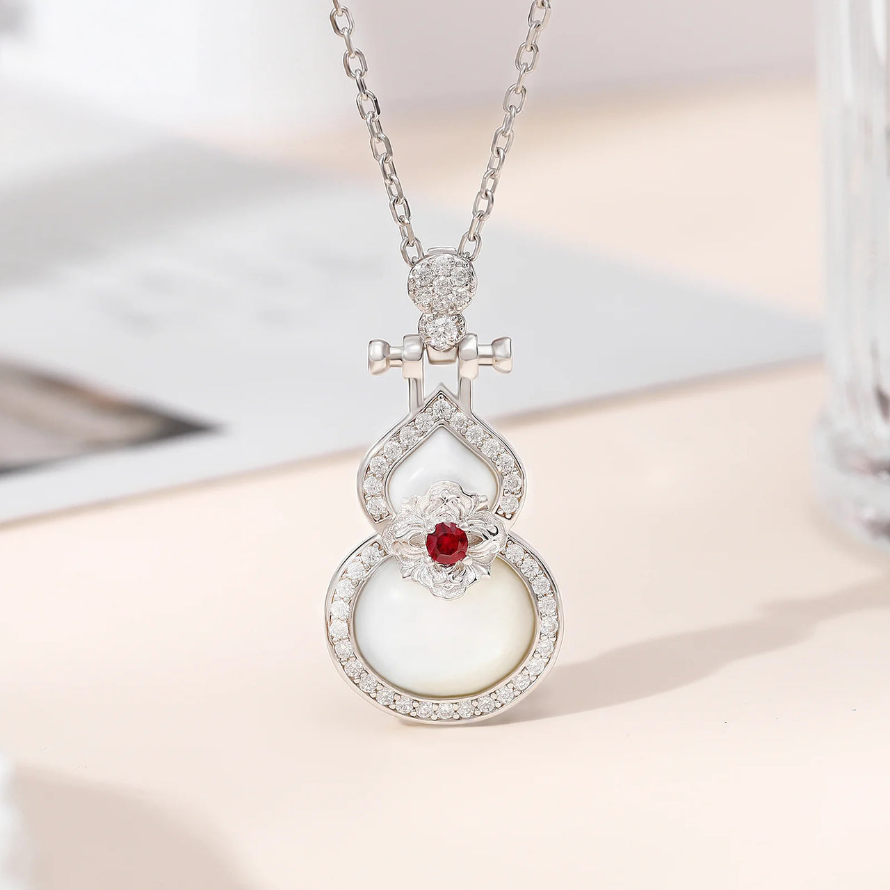 MOISSANITE DIAMOND DOUBLE SIDED PEARL GOURD PENDANT IN STERLING SILVER