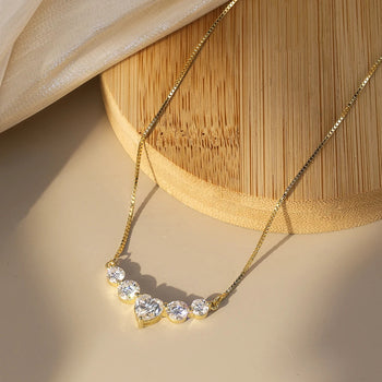 MOISSANITE DIAMOND HEART CHARM NECKLACE IN STERLING SILVER