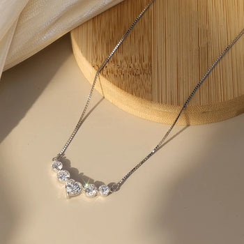 MOISSANITE DIAMOND HEART CHARM NECKLACE IN STERLING SILVER