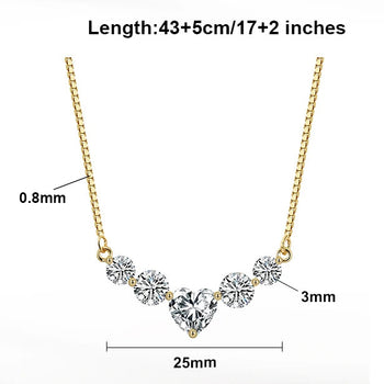 Gold necklace with diamond pendant on a white background, featuring product details.