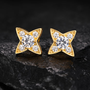Boucles d'oreilles puces en forme d'étoile à quatre branches serties de diamants et de moissanite, en argent sterling