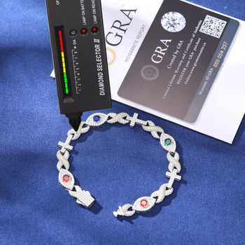 Bracelet en argent sterling orné de moissanites, diamants et croix infinie avec œil protecteur.