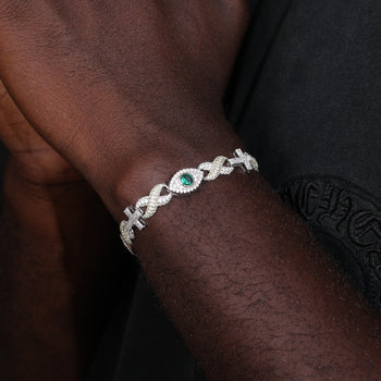 Bracelet en argent sterling orné de moissanites, diamants et croix infinie avec œil protecteur.