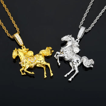 Gold and silver horse-shaped pendants on black background