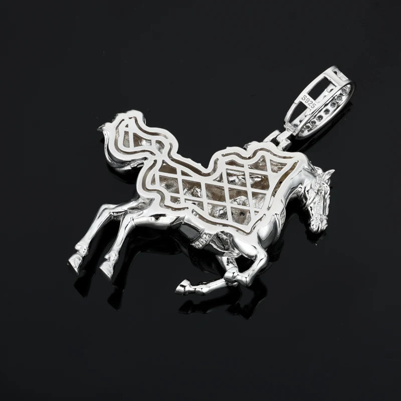 Silver horse pendant with intricate design on a black background