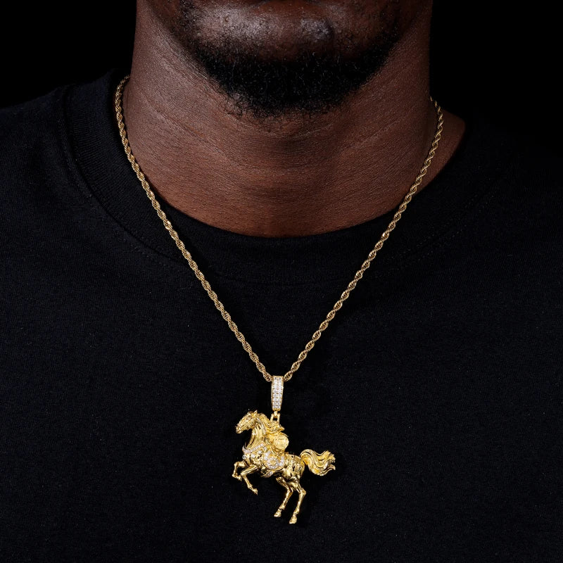 Gold horse pendant necklace on a black background