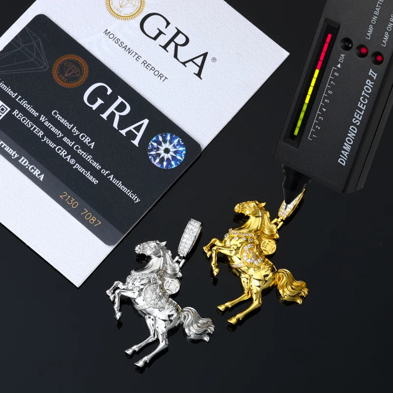 Gold and silver horse-shaped jewelry pieces with a GRA diamond report card and diamond selector tool on a black background.