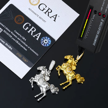 Gold and silver horse-shaped jewelry pieces with a GRA diamond report card and diamond selector tool on a black background.