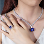 PEAR CUT MOISSANITE AND LAB GROWN SAPPHIRE NECKLACE RING EARRINGS SET IN STERLING SILVER