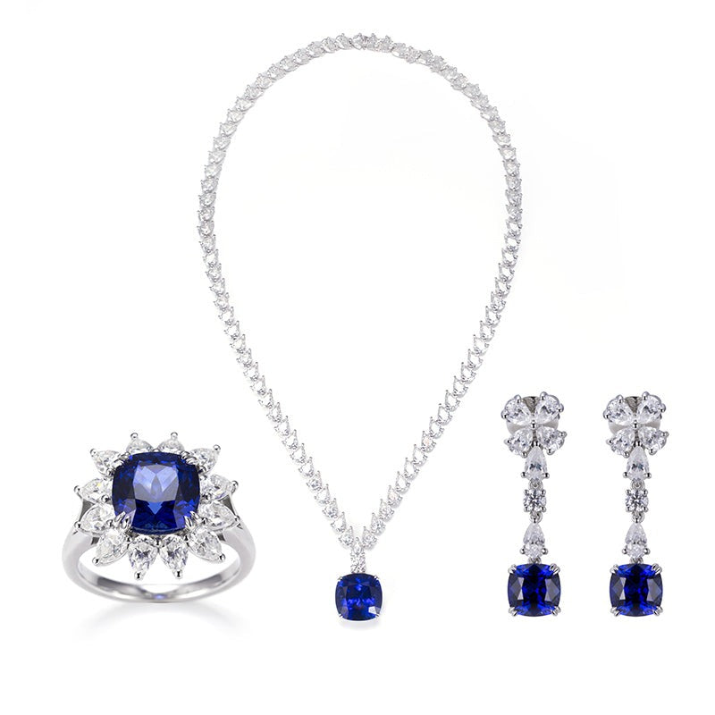 PEAR CUT MOISSANITE AND LAB GROWN SAPPHIRE NECKLACE RING EARRINGS SET IN STERLING SILVER