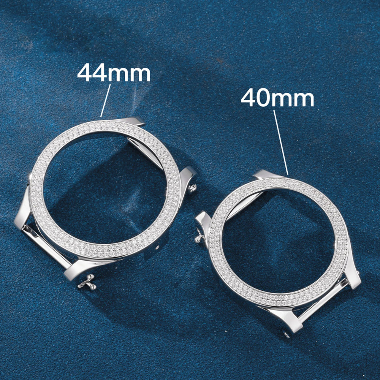 Smartwatch with a black strap and diamond-studded bezel on a blue background