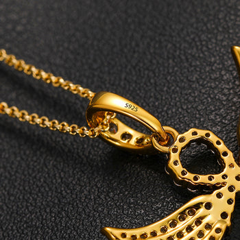 Pendentif croix en forme d'aile serti de diamants et de moissanite, en argent sterling