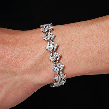 Bracelet en argent sterling orné de maillons en forme de dollar et de moissanite 