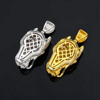 Gold and silver lacrosse head pendants on a black background