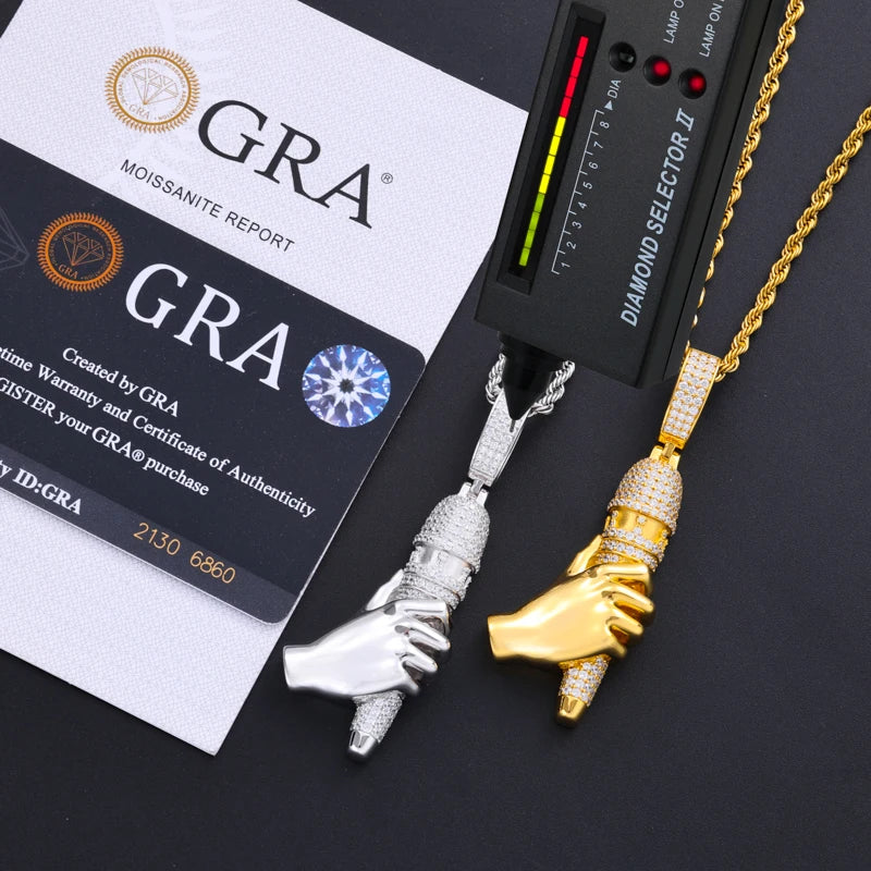 Gold and silver foot-shaped pendants with a diamond selector and GRA report card on a black background
