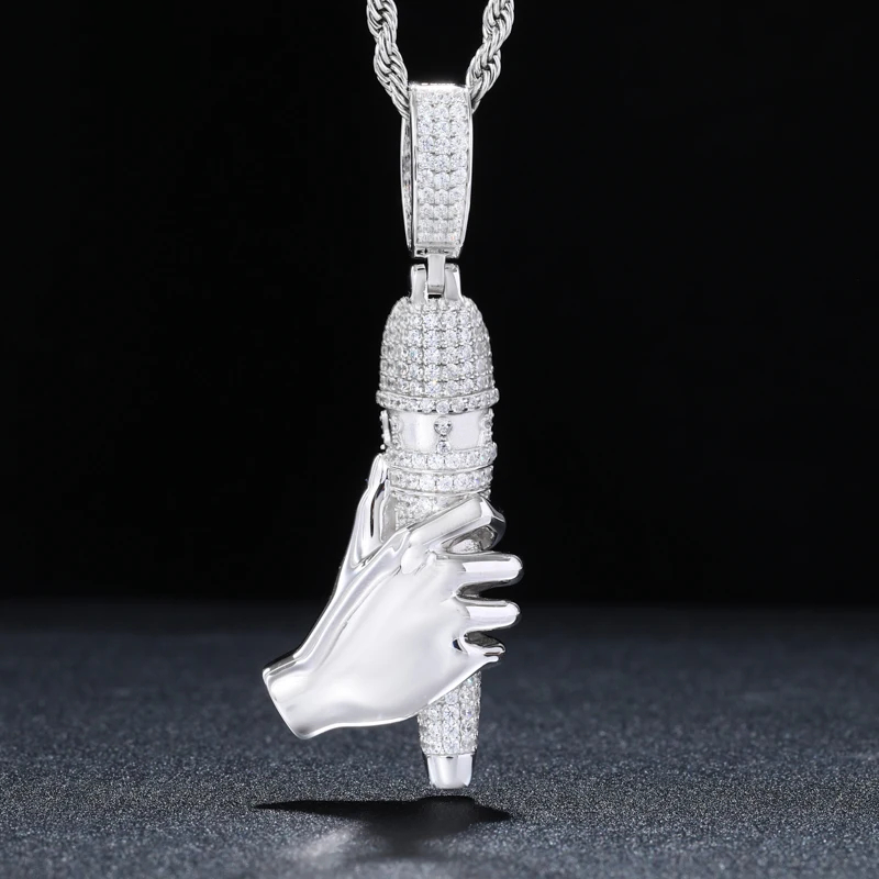 Silver high-heeled shoe pendant with chain on a dark background