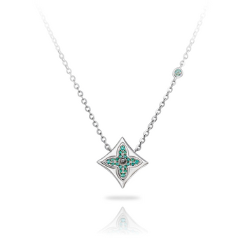 Star-shaped pendant necklace with green gemstones on a white background