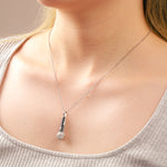 MOISSANITE MICROPHONE PENDANT IN STERLING SILVER