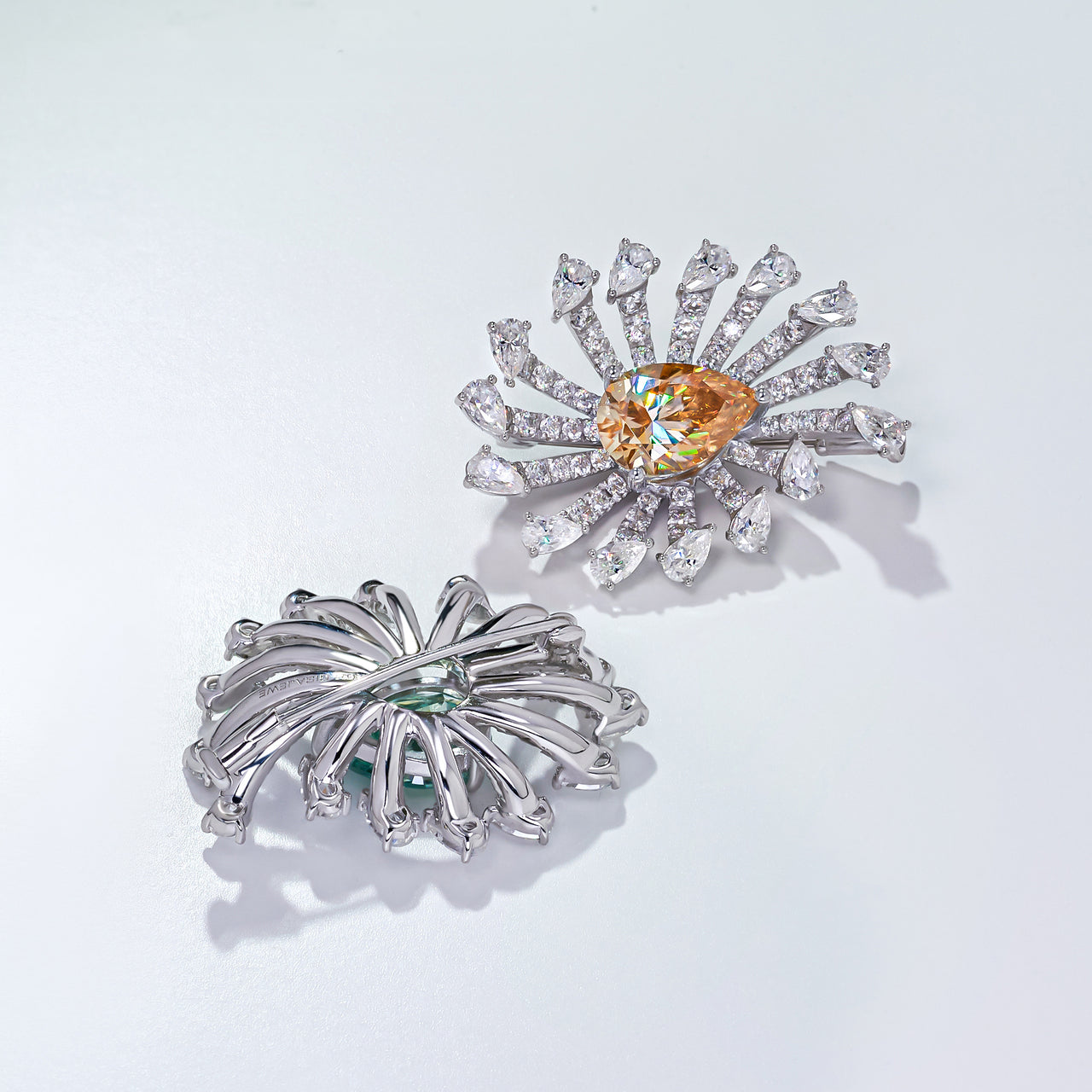 MOISSANITE PEAR CUT BROOCH IN STERLING SILVER