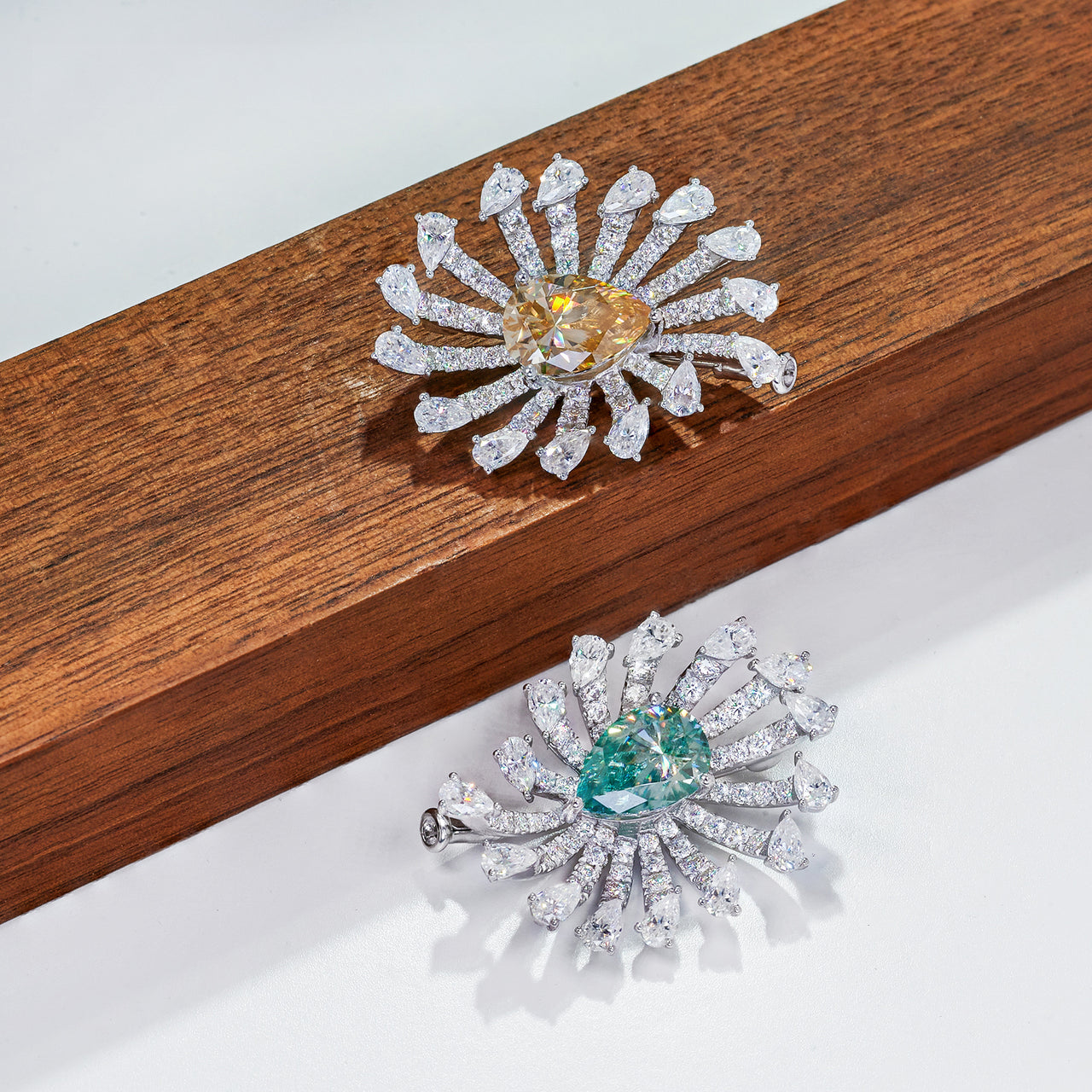 MOISSANITE PEAR CUT BROOCH IN STERLING SILVER