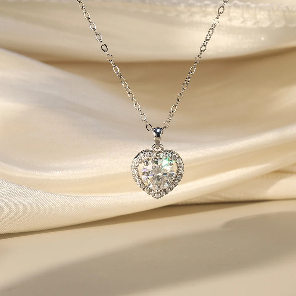 MOISSANITE ROUND BRILLIANT HALO HEART PENDANT IN STERLING SILVER