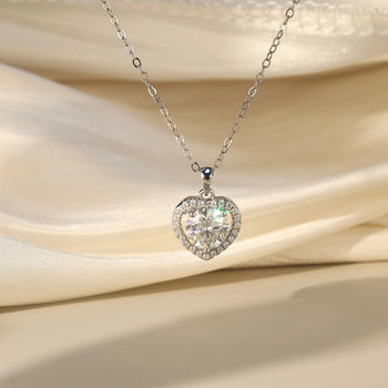 MOISSANITE ROUND BRILLIANT HALO HEART PENDANT IN STERLING SILVER