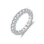 MOISSANITE TENNIS ETERNITY BAND RING WITH SIDE HALO IN STERLING SILVER