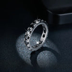 BLACK ROUND MOISSANITE ETERNITY BAND RING IN STERLING SILVER