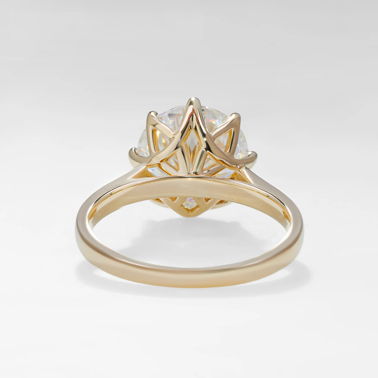 ROUND CUT MOISSANITE ETERNAL GLOW RING IN SOLID GOLD