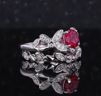 ROUND LAB GROWN RUBY AND MOISSANITE DIAMOND RING IN 10K WHITE GOLD