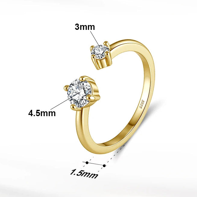 Gold ring with diamond details and product information on a white background