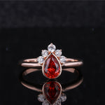 PEAR CUT LAB GROWN RUBY & MOISSANITE RING IN 9K GOLD