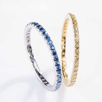 MOISSANITE ETERNITY BAND RINGS IN SOLID GOLD