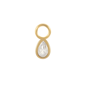Gold pendant with a clear gemstone on a white background