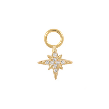 Gold star-shaped charm with embedded stones on a white background
